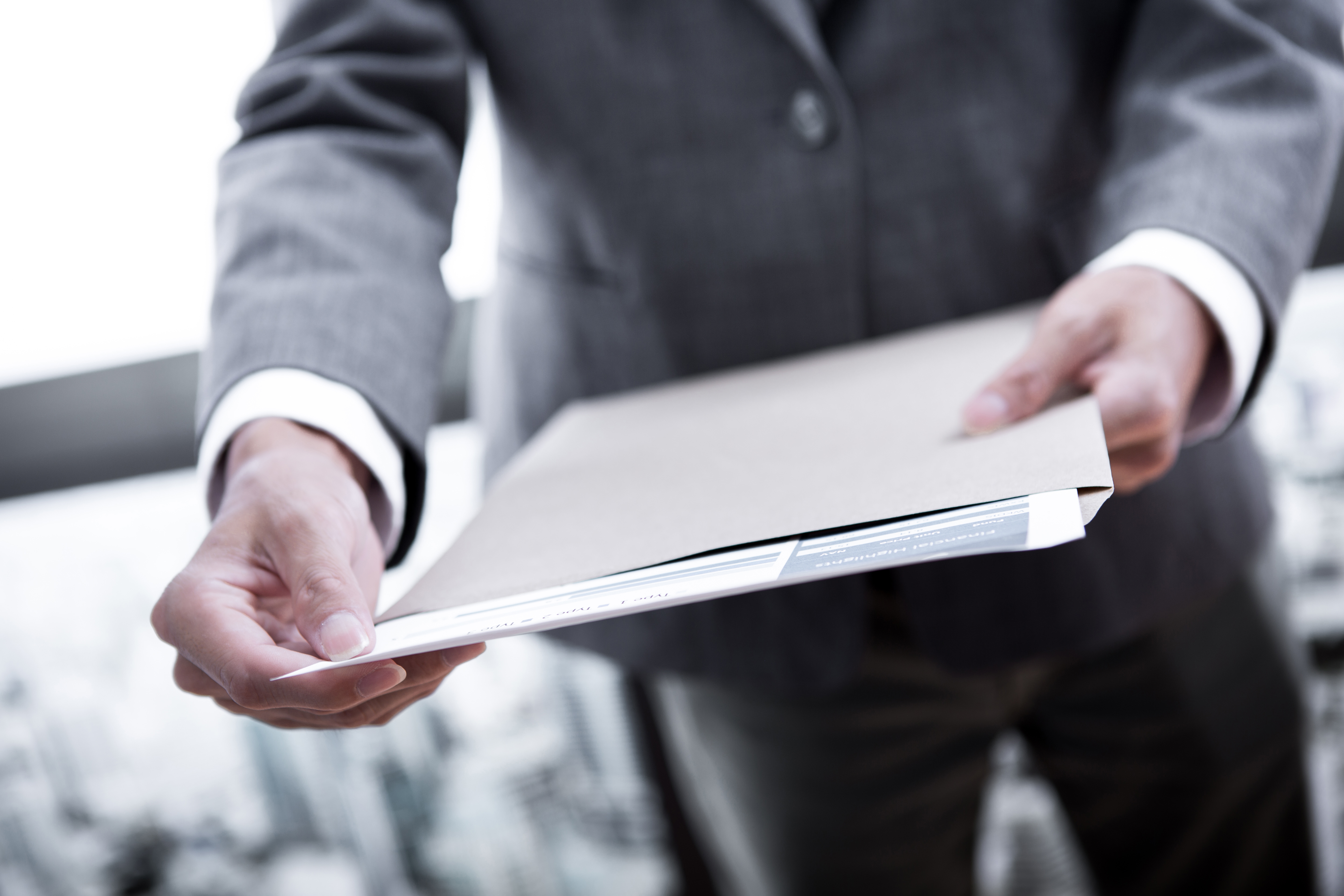 Investor with documents required to obtain Dominica citizenship by investment